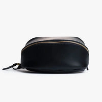 Lay Flat leather toiletry bag in Black closed front view