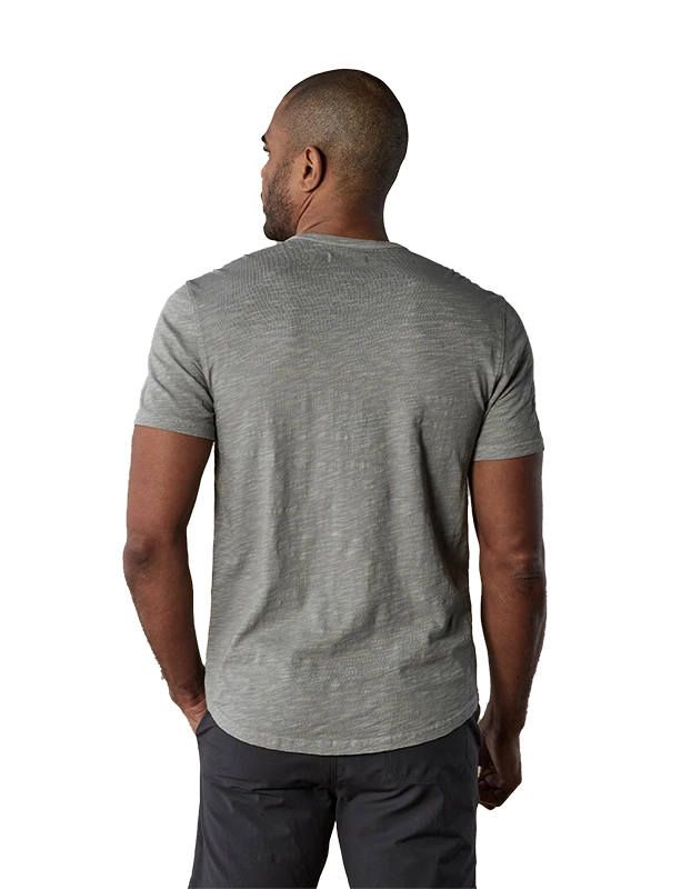 Model wearing The Normal Brand Legacy Jersey Short sleeve t-shirt in greystone color, rear view