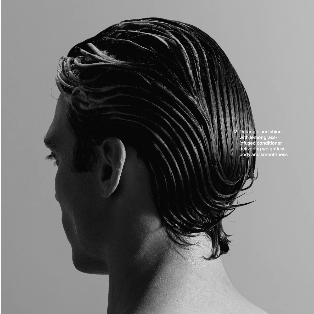 Man with wet combed hair styled using Blind Barber Lemongrass Tea Conditioner, weightless detangling shine, The Simple Man