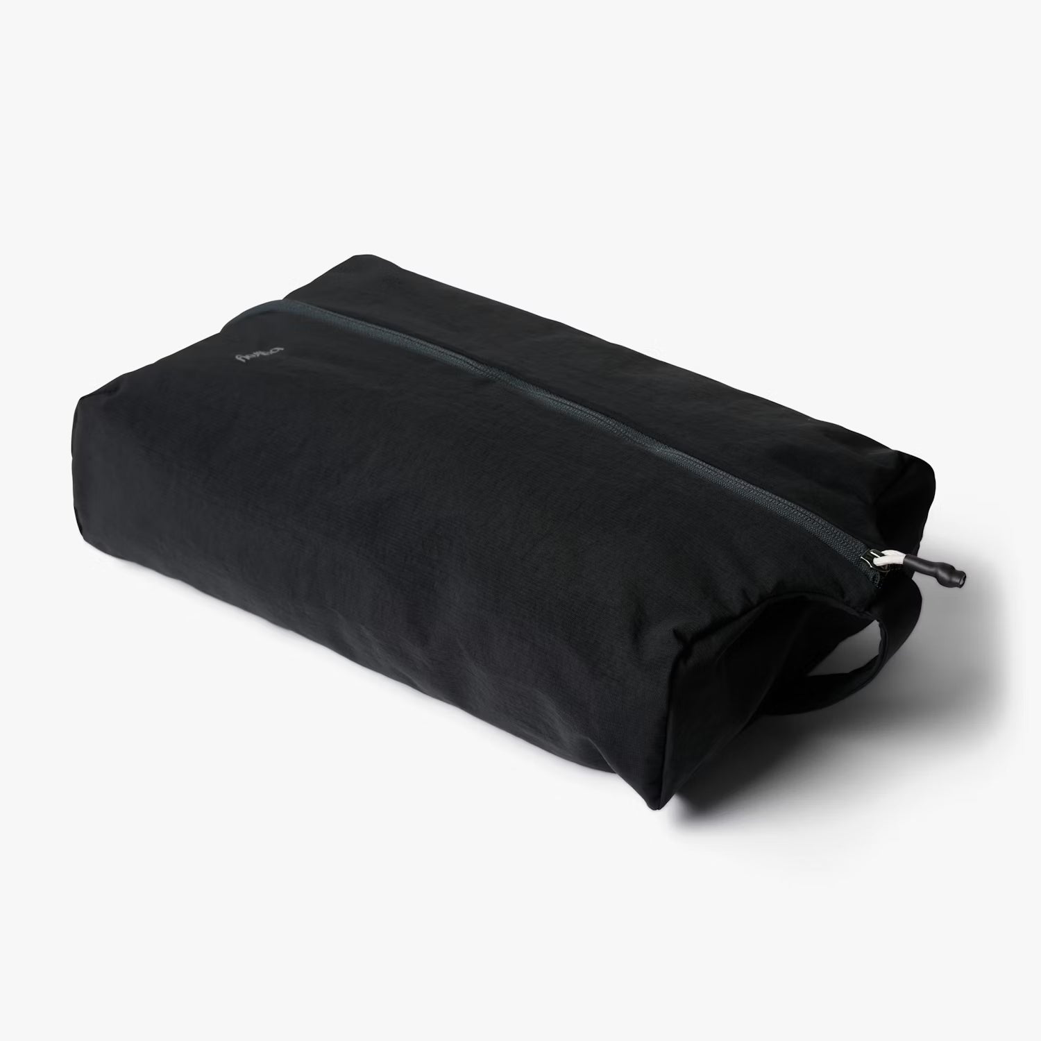 Black toiletry bag on a white background