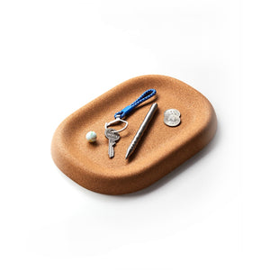 Cork Little Cloud Tray holding keys, a pen, a coin and a small stone - The Simple Man
