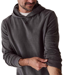 Close-up of Luxe Slub Hoodie in Asphalt hood and cuff detail on man wearing bracelet - The Simple Man