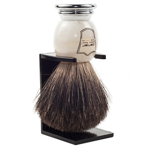 Parker Ivory Marbled Black Badger shaving brush displayed on the included black acrylic stand.