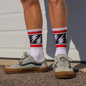SOCCO x Mike Vallely white lightning bolt crew socks on model
