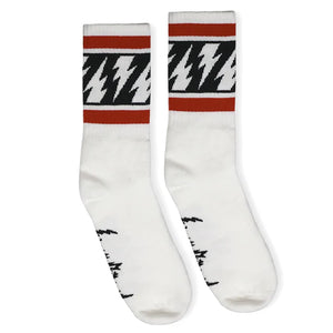 White crew socks with black lightning bolt and red stripes