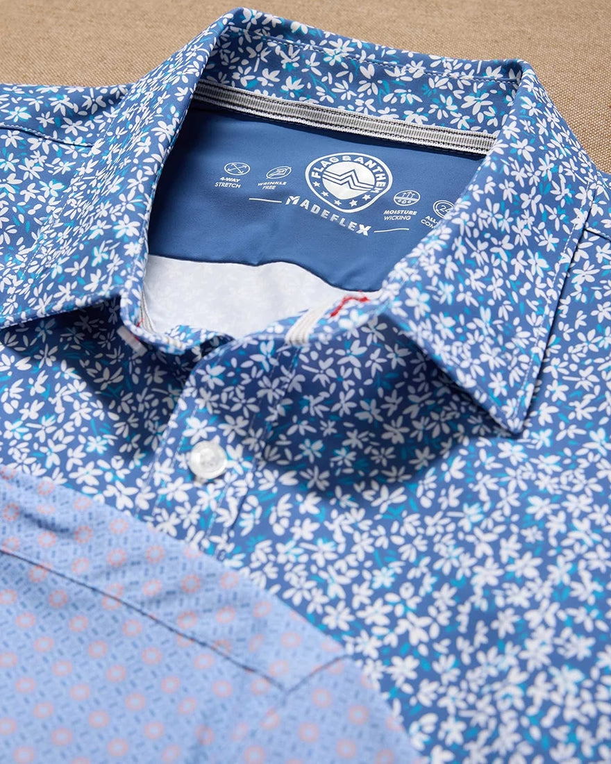 Flag and Anthem MadeFlex Journey Shirt collar detail – interior label showing 4-way stretch wrinkle-free moisture-wicking features blue floral print