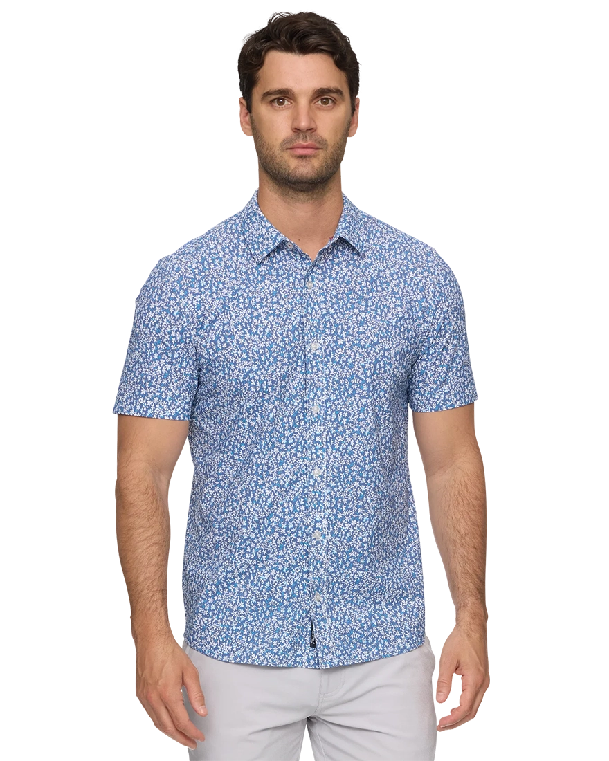 Man wearing Flag and Anthem MadeFlex Journey Stretch Shirt in blue floral print – wrinkle-free 4-way stretch men's button-down tailored athletic fit