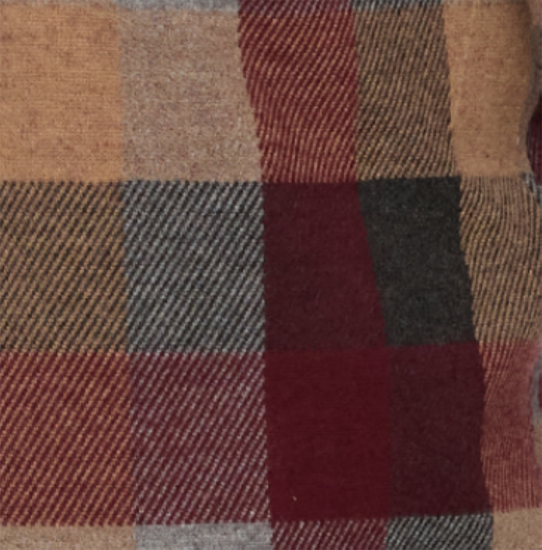 Close-up of a checkered fabric with brown, red, and gray colors.