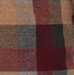 Close-up of a checkered fabric with brown, red, and gray colors.