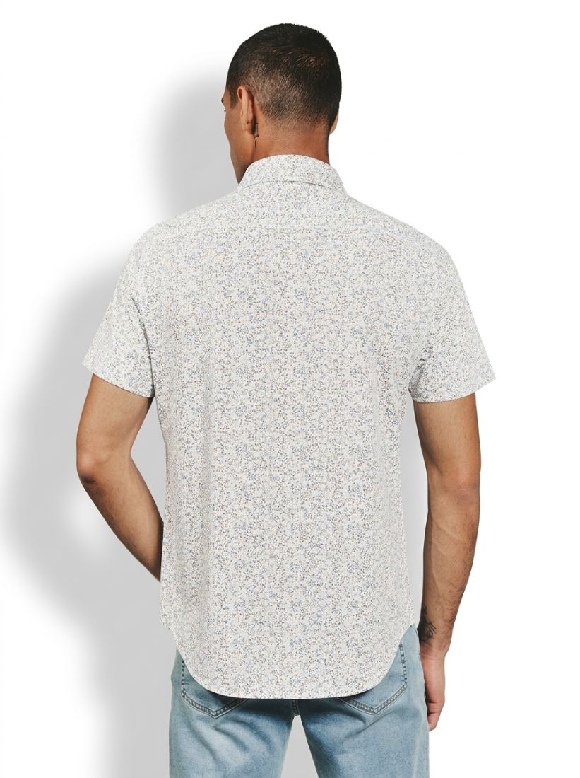 Back view of Mercer Natural short sleeve button-up shirt on man – all-over micro floral print stretch knit men's shirt