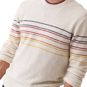 Close-up of the Snowhill Sunset Stripe merino sweater showing fine navy, red, orange and yellow stripes and ribbed neckline