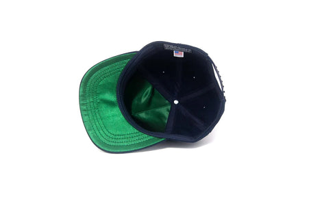 Interior view of NY City Series III snapback with green satin underbrim and sweatband