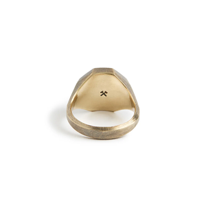 Inside of the brass Otto Signet Ring showing the crossed hammers hallmark and bright interior