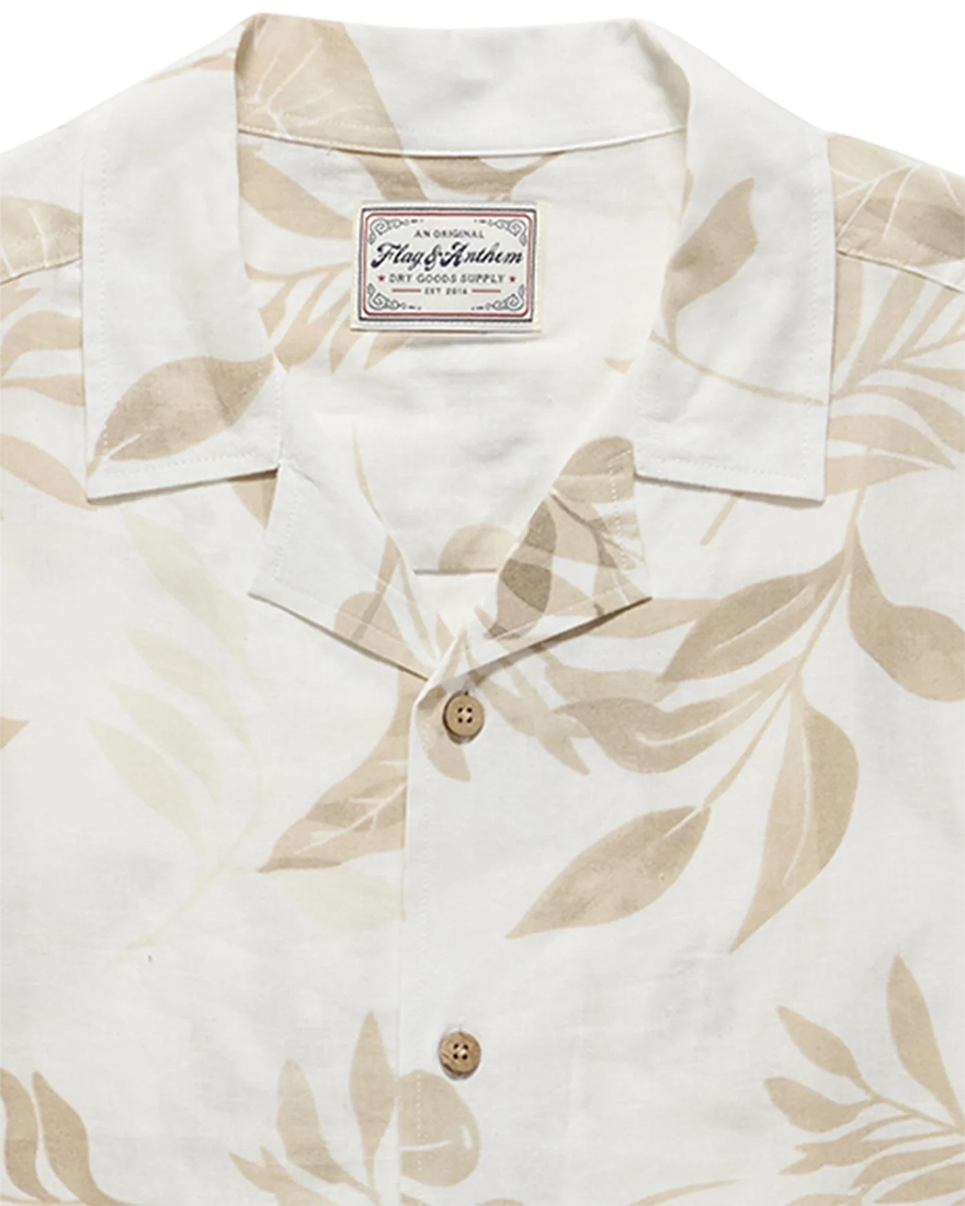 Flag & Anthem Parsons Camp Collar Shirt – close-up of camp collar and tone-on-tone tropical leaf print on men's linen blend shirt