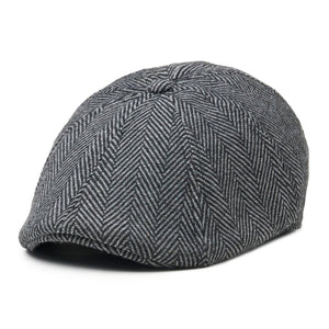 Side view of eight-panel gray herringbone flat cap
