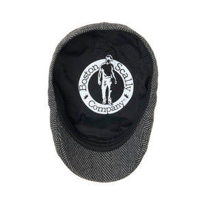 Inside of the gray herringbone scally cap showing the Boston Scally Company label