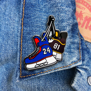 Heated Rivalry Hockey Skates Enamel Pin pinned to denim jacket, black hard enamel hockey skates pin, lifestyle shot -- The Simple Man