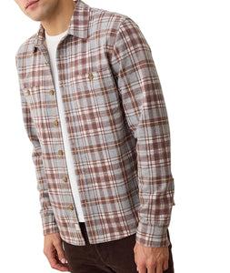 Side view of Pacifica Stretch Twill Overshirt, warm plaid colorway, shown layered with a white tee and brown pants – men's outerwear