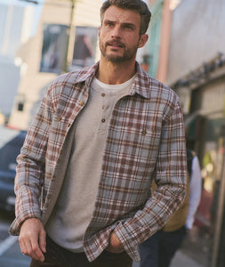 Man wearing Pacifica Stretch Twill Overshirt in yarn-dye warm plaid on the street, breathable men's overshirt from The Simple Man Omaha