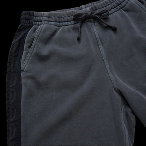 Howler Brothers Palmetto Chill Shorts detail – elastic drawcord waistband and contrast embroidered side panel in Washed Navy