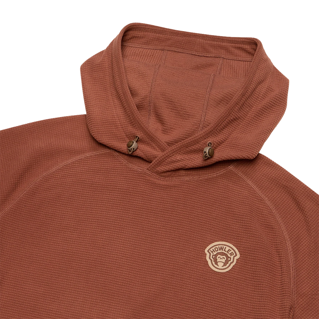 Close-up of waffle grid fleece texture, drawcord hood and Howler chest patch on the Mink Brown Palo Duro Fleece Hoodie, The Simple Man