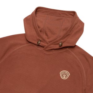 Close-up of waffle grid fleece texture, drawcord hood and Howler chest patch on the Mink Brown Palo Duro Fleece Hoodie, The Simple Man