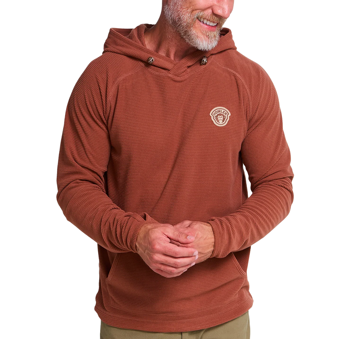 Man in the Mink Brown Palo Duro Fleece Hoodie showing raglan sleeves, button hood placket and Howler chest patch, front view, The Simple Man
