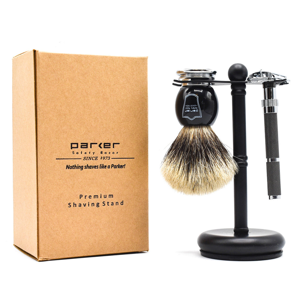 Parker Deluxe matte black razor and brush stand shown with shave brush, safety razor, and packaging box from The Simple Man.