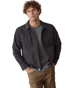 Man wearing Faded Black overshirt over grey tee, front view on model - The Simple Man