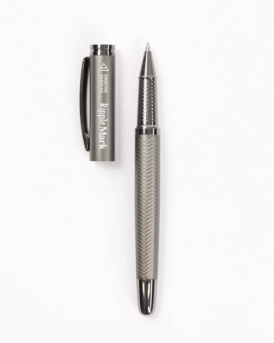 Ripple Mark metal rollerball pen with textured body and cap removed – Cognitive Surplus design sold by The Simple Man