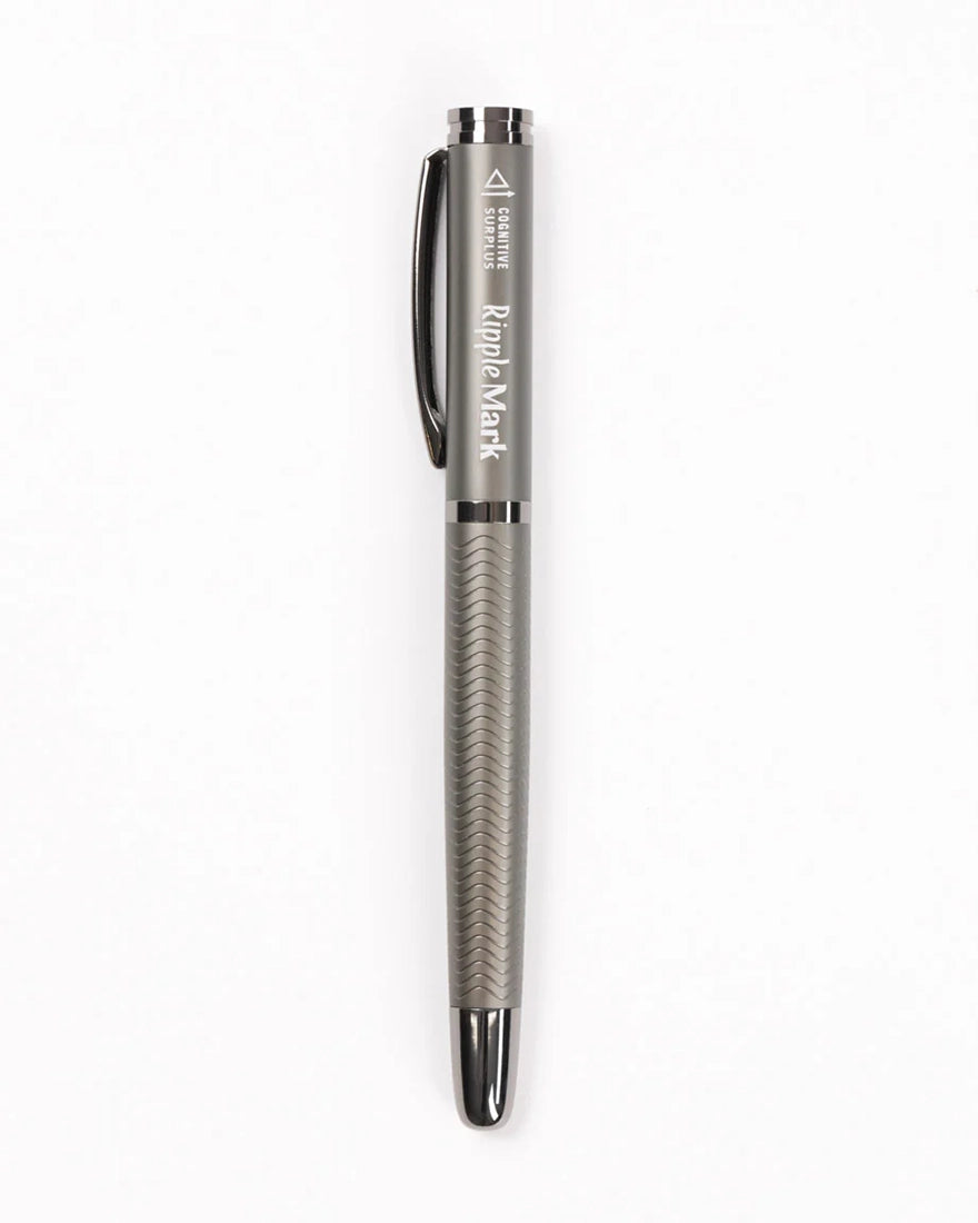 Ripple Mark Pen full view with textured metal body and engraved logo – premium writing instrument from The Simple Man