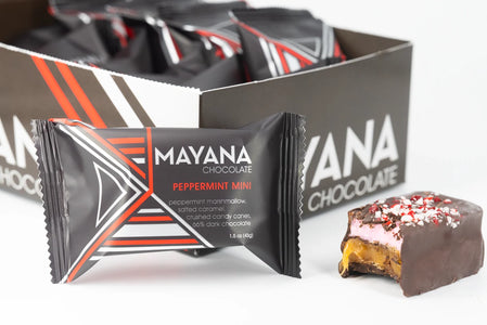 Mayana Chocolate Peppermint Mini Bar with wrapper and cut piece showing caramel, marshmallow, and candy cane topping.