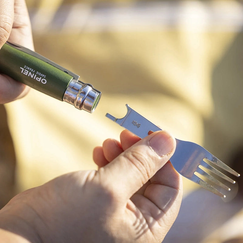 lifestyle photo showing the fork insert, being attached to the body of the knife
