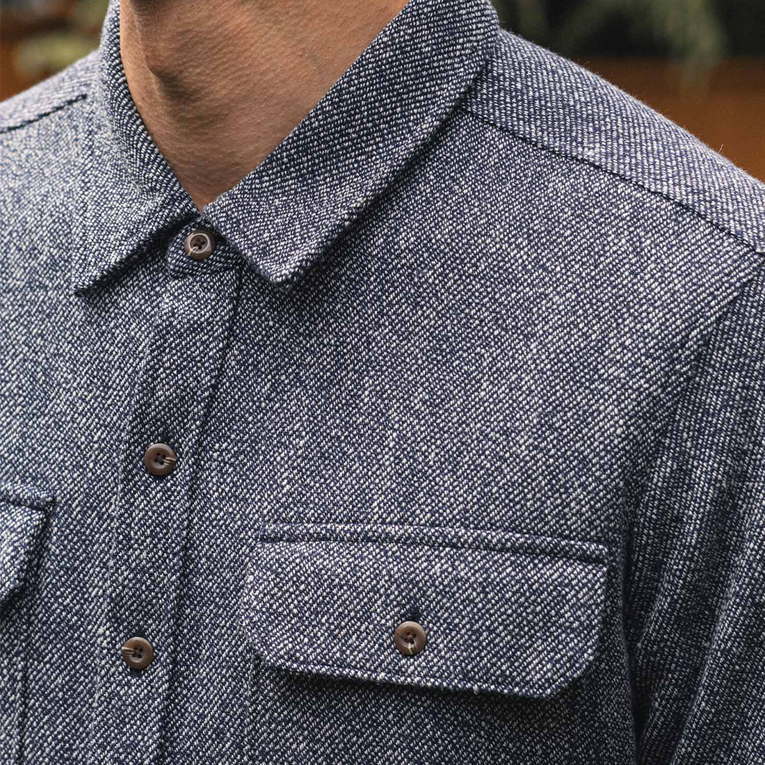 Close up of the collar, button placket and flap chest pocket on the Pointer overshirt in Ocean Marl - The Simple Man