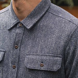 Close up of the collar, button placket and flap chest pocket on the Pointer overshirt in Ocean Marl - The Simple Man