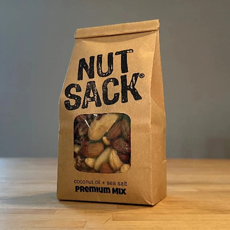 Nut Sack Premium Mix, snack bag of nuts, 6oz, front of bag on a table