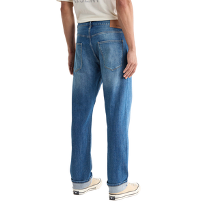Back view of Preston straight leg jeans showing back pockets, leather waistband patch and a faded seat