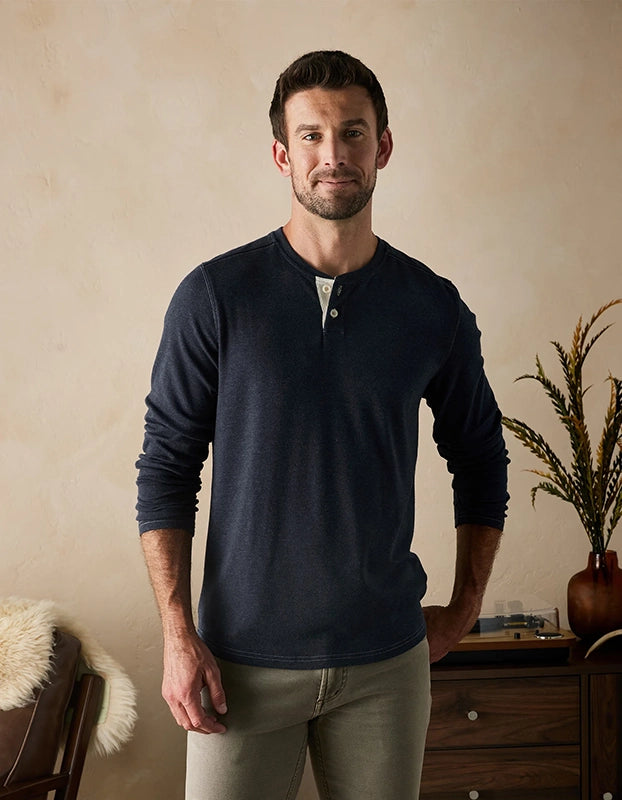 Model Wearing The Normal Brand Puremeso 2 Button henley shirt in navy, front view