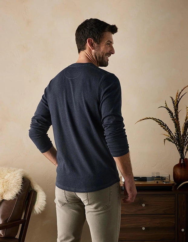 Model Wearing The Normal Brand Puremeso 2 Button henley shirt in navy, rear view