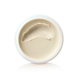Open jar of Quicksand showing its gritty matte wax, detail view from above