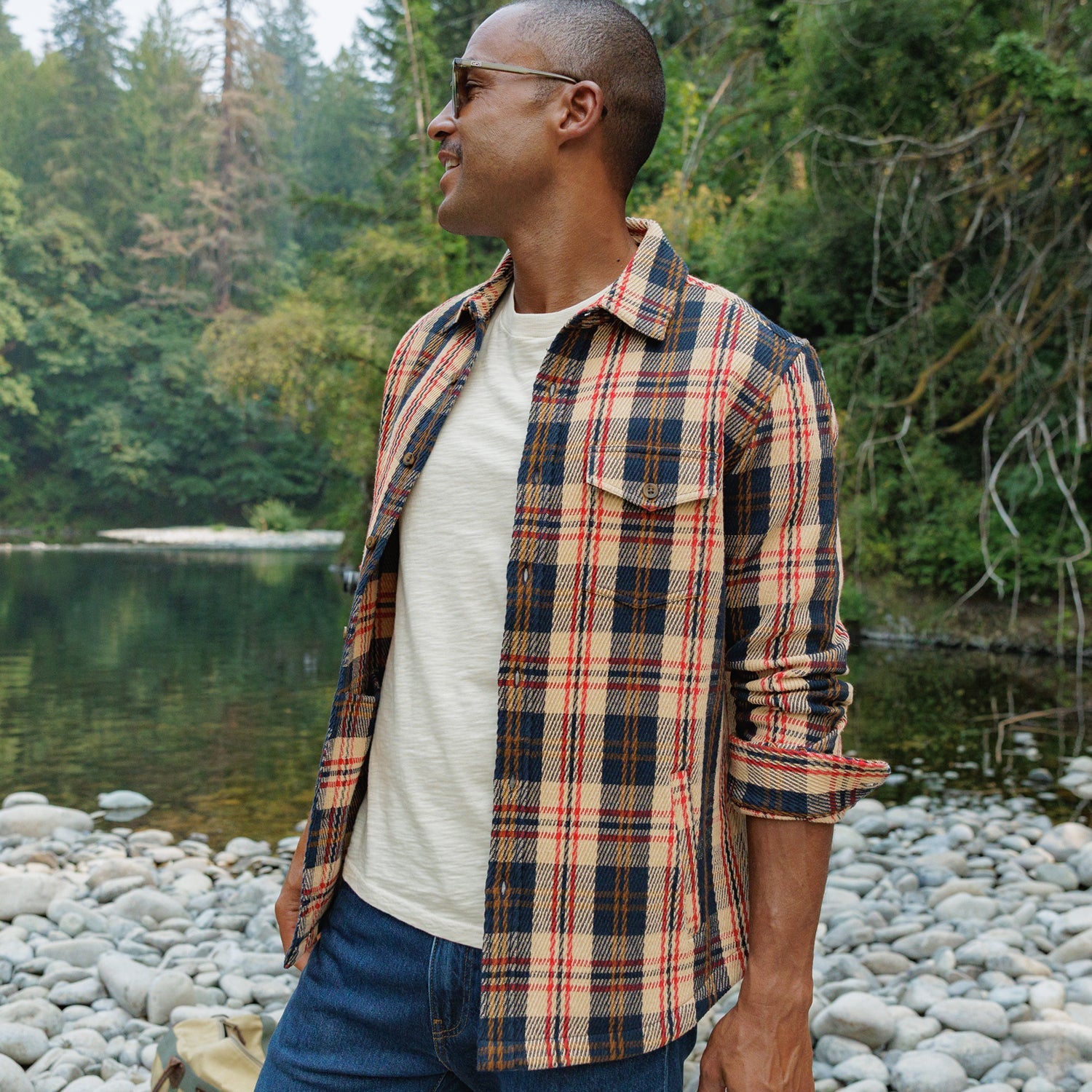 Man looking over his shoulder in Heavy Twill Shacket in Navy Multi Plaid - The Simple Man