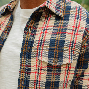Close-up of navy multi plaid twill and chest pocket on Heavy Twill Shacket - The Simple Man