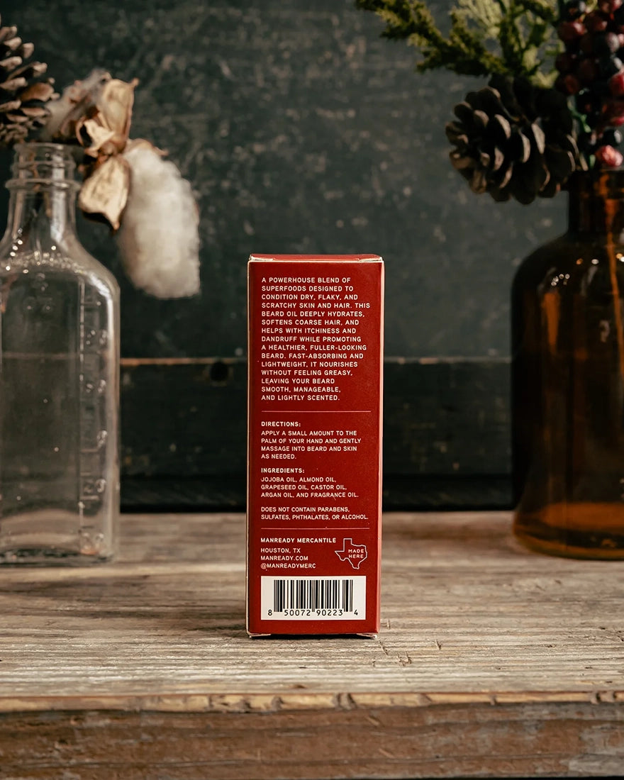 Back of Manready Mercantile Red Label beard oil box with ingredient and usage details