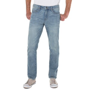 Front view on model of Regent relaxed straight jeans in Palos Verdes, showing room through the thigh and tapered leg