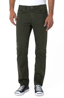 Model wearing Regent Relaxed Straight Olive Twill Denim - front view | durable men's pants at The Simple Man