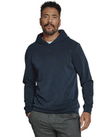 Close-up of man wearing navy REV Hoodie – soft stretch modal hoodie for men