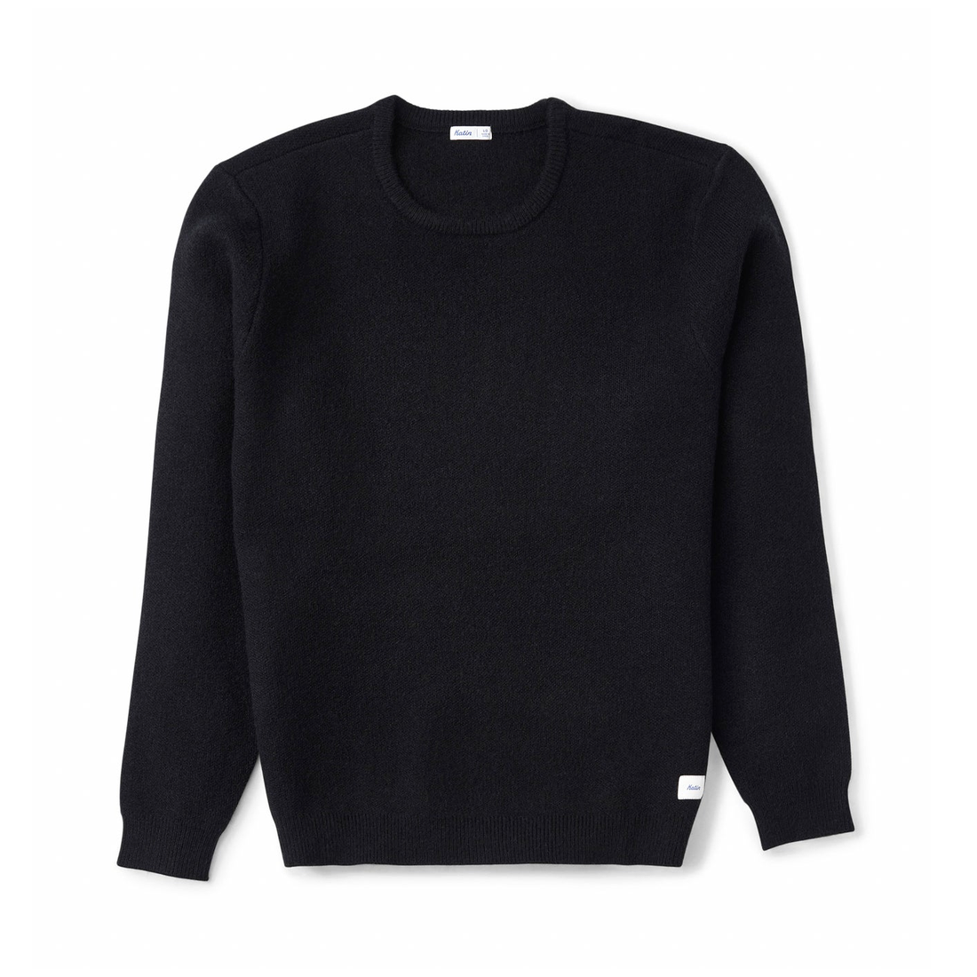 Rivers Sweater in Black, flat lay front view of a classic fit crew neck with a woven patch label at the hem