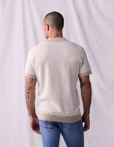 Back view of The Normal Brand Robles Knit Polo in ivory khaki – 100% cotton jacquard knit contrast rib cuffs and hem band men's short sleeve