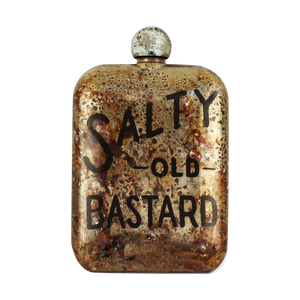 Close-up of Salty Old Bastard etched whiskey flask with aged patina finish – 6oz stainless steel men’s flask from The Simple Man