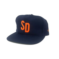 San Diego navy snapback hat with orange SD embroidered letters, flat brim, 3/4 view – The Simple Man